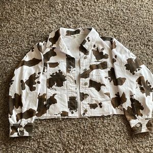Brown and white cow print BaeVely denim jacket. Size: Small